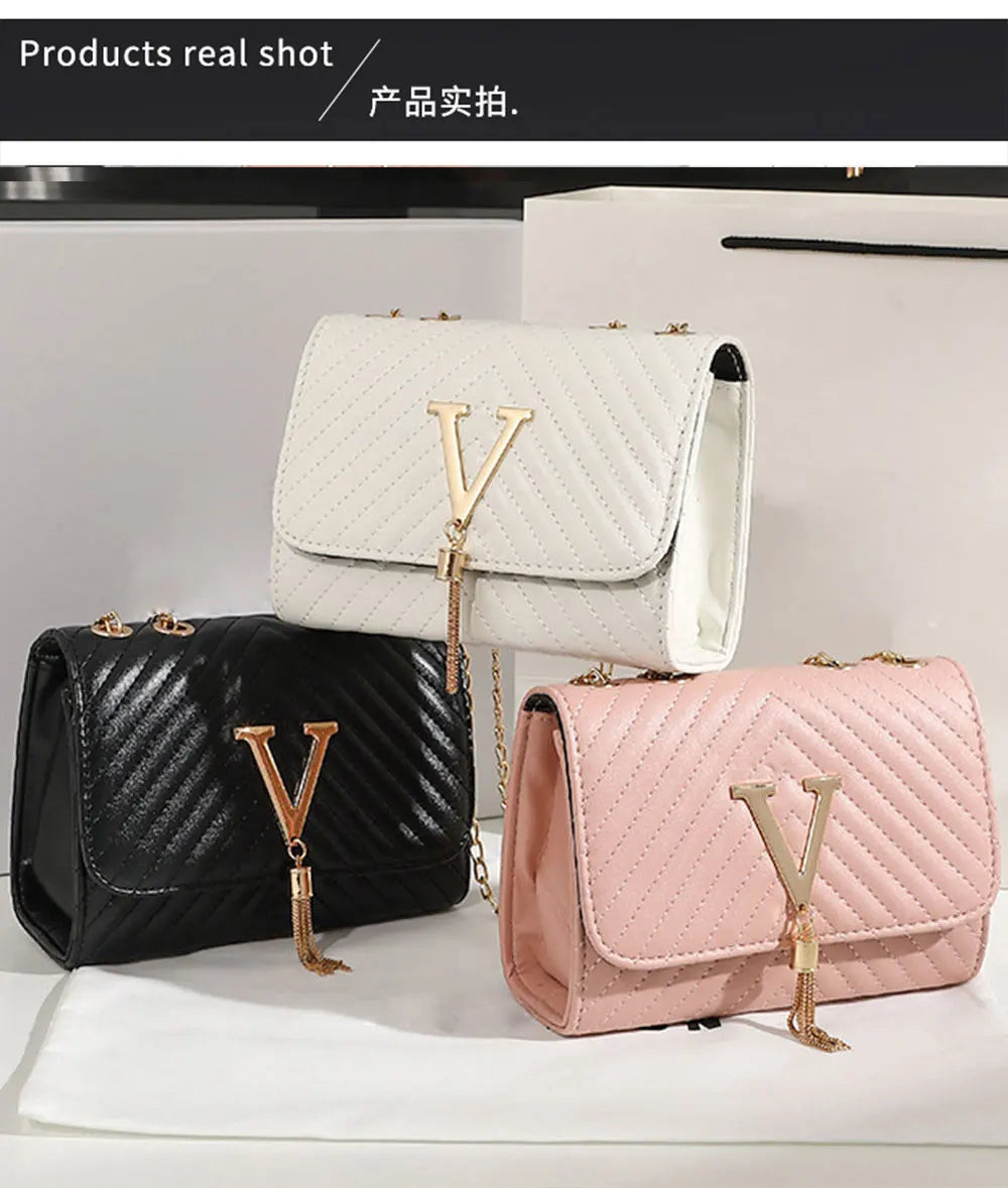 Chevron Quilted "V" Flap Crossbody Bag with Tassel Detail
