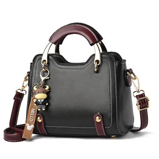 Chic Duo-Tone Top Handle Satchel with Bull Charm