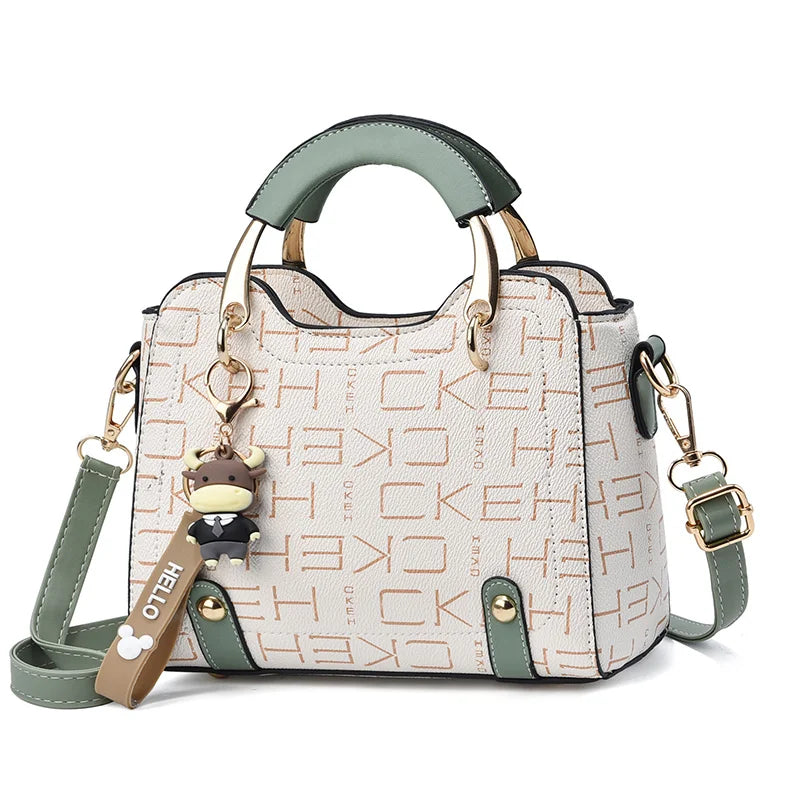Chic Duo-Tone Top Handle Satchel with Bull Charm