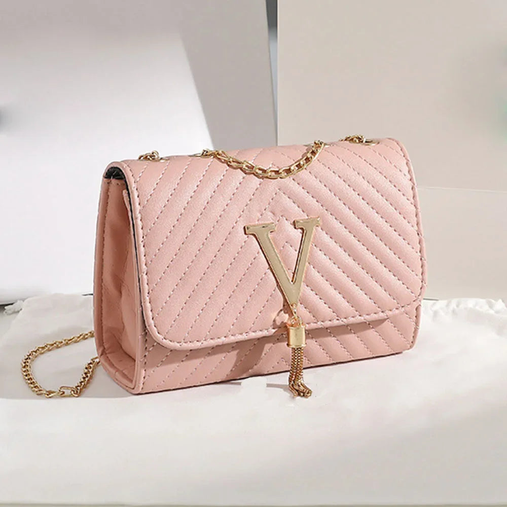 Chevron Quilted "V" Flap Crossbody Bag with Tassel Detail