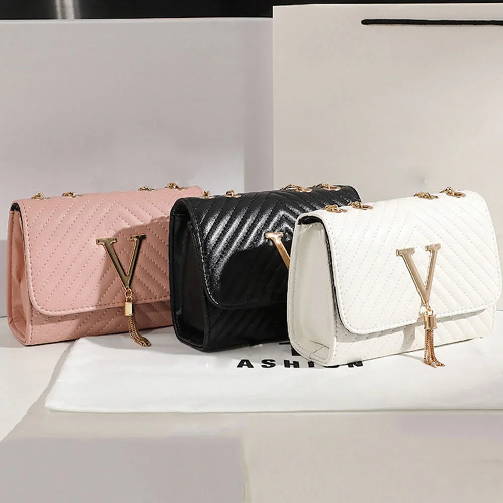 Chevron Quilted "V" Flap Crossbody Bag with Tassel Detail