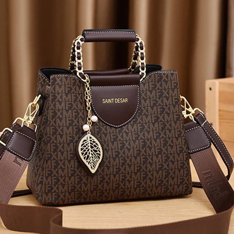 Monogram Satchel – Elegant Top-Handle Bag with Leaf Charm
