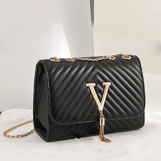 Chevron Quilted "V" Flap Crossbody Bag with Tassel Detail